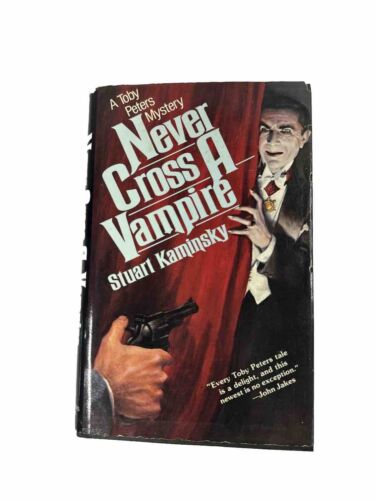 FIRST EDITION, A TOBY PETERS MYSTERY NEVER CROSS A VAMPIRE STUART KAMINSKY